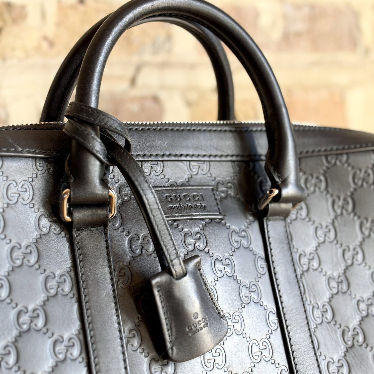 Gucci Guccissima Leather Briefcase – Black GG Embossed, Detachable Shoulder Strap
